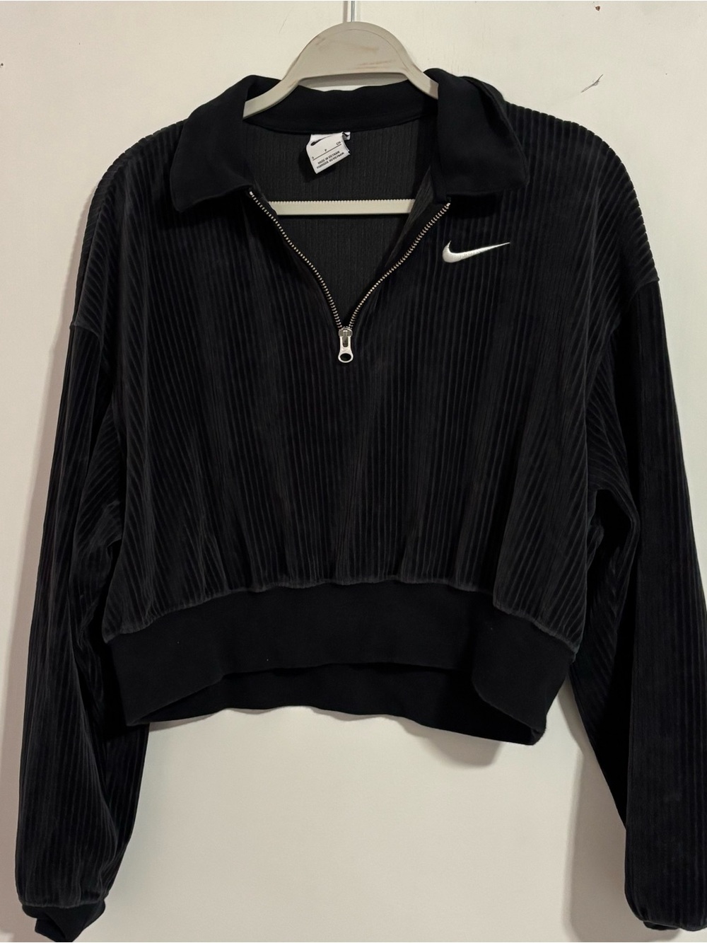 Nike cropped velour quarter zip sweatshirt in black